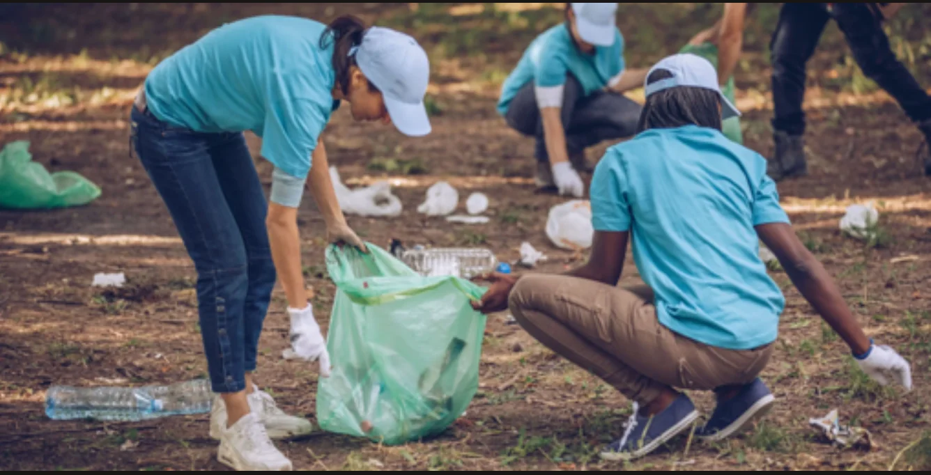 Volunteer team working together on a community cleanup