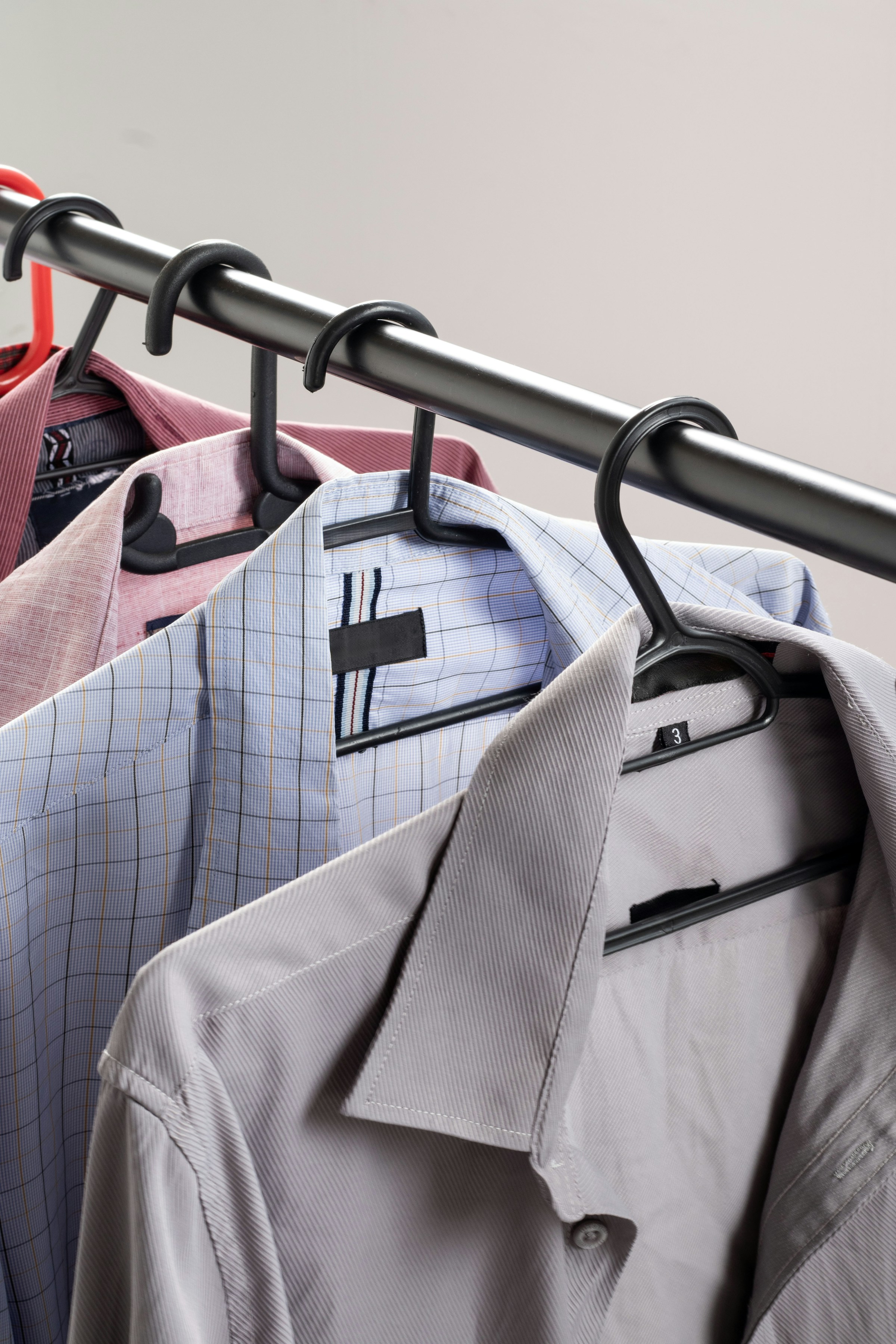 Clothing and merchandise displayed on a rack