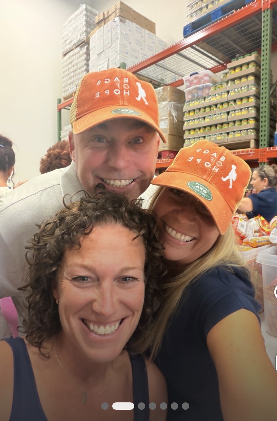 Neighbors connecting around food support.